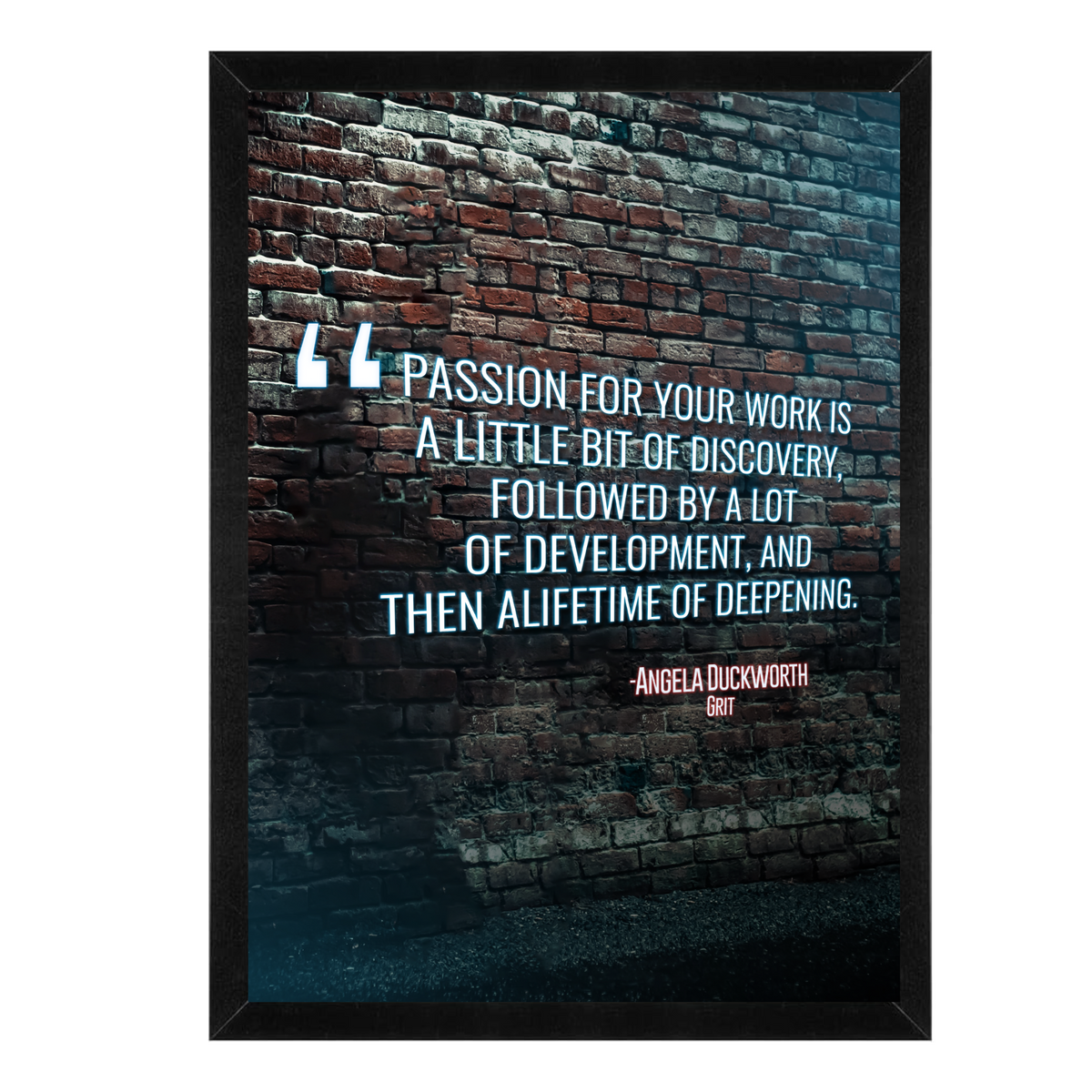 Framed print with a motivational quote on a brick wall background